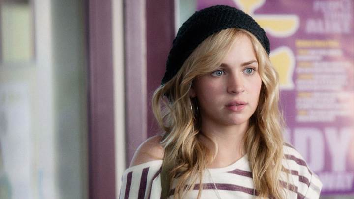 Britt Robertson Wearing Black Cap N White Lining Top